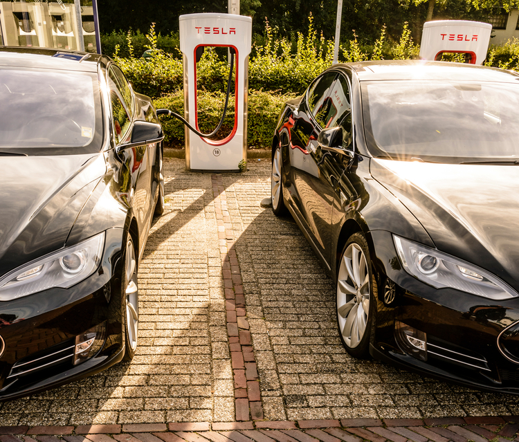 Tesla Model S electric cars at a supercharger charging station